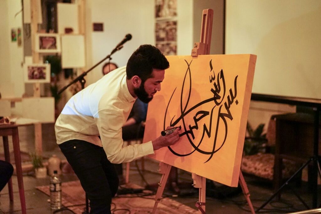 Artist doing art on canvas